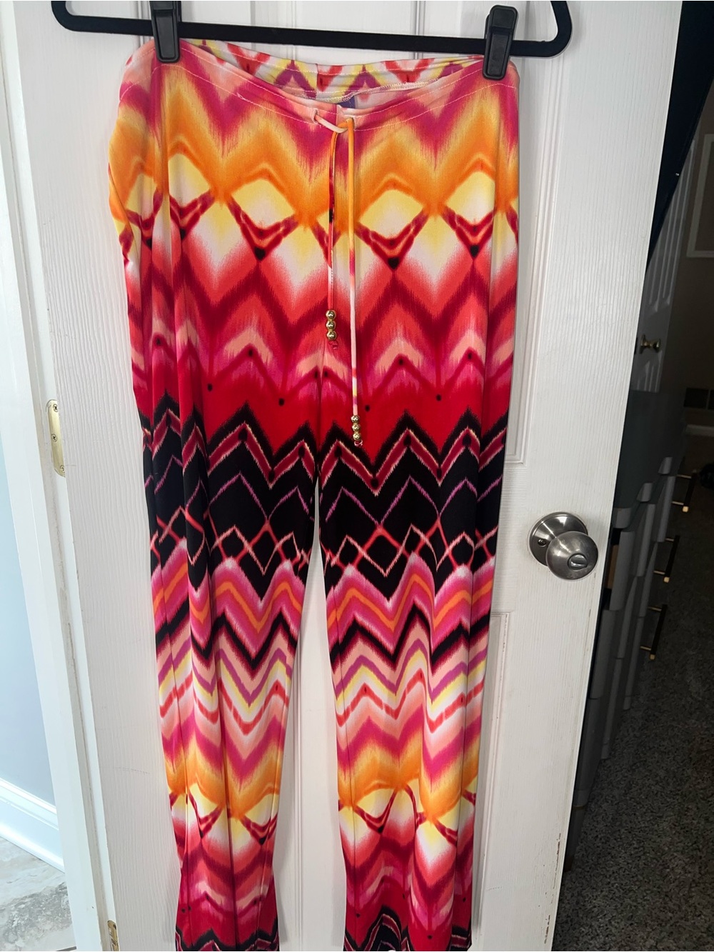 ADORA Multicolor Chevron Wide-Leg Palazzo Pants - Pink, Orange, Black.